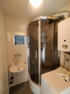 Kúpeľňa v ubytovaní Apartamenty Częstochowa + 37 fotografií