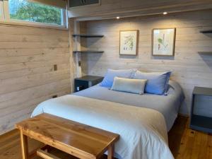 Postel nebo postele na pokoji v ubytování Amukan Lodge