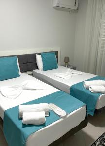 Postel nebo postele na pokoji v ubytování Hotel New York