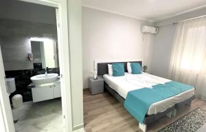 Postel nebo postele na pokoji v ubytování Hotel New York