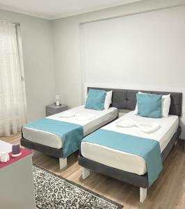 Postel nebo postele na pokoji v ubytování Hotel New York