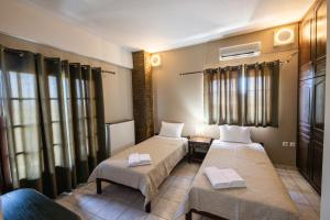 Posteľ alebo postele v izbe v ubytovaní Villa Georgina B&B
