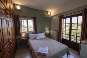 Posteľ alebo postele v izbe v ubytovaní Villa Georgina B&B