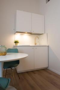 Kuchyň nebo kuchyňský kout v ubytování POSA - Charming Rooms + 14 fotografií