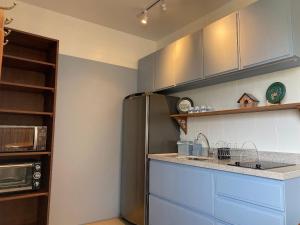 Η κουζίνα ή μικρή κουζίνα στο Apto temático Bauernmalerei Centro Pomerode