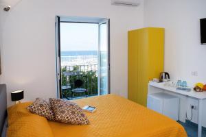 Postel nebo postele na pokoji v ubytování Punta Lingua Relais - Room 3 Port View