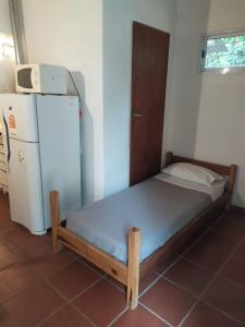 Ліжко або ліжка в номері Apart Refugio del Alba
