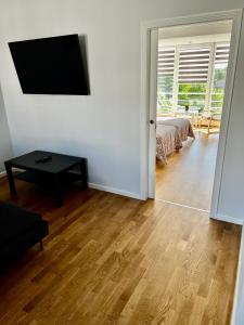 Vilniaus 96 apartments tesisinde bir televizyon ve/veya eğlence merkezi