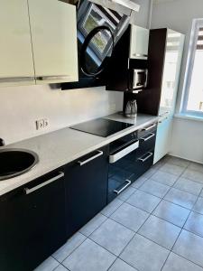 Dapur atau dapur kecil di Vilniaus 96 apartments