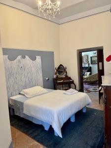 A bed or beds in a room at B&B 'Degli Artisti'