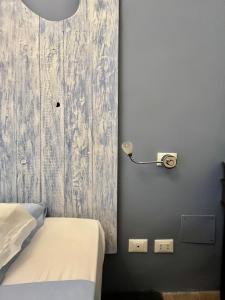A bed or beds in a room at B&B 'Degli Artisti'