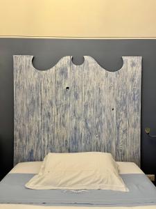 A bed or beds in a room at B&B 'Degli Artisti'