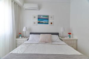 Postel nebo postele na pokoji v ubytování Apartamento en zona privilegiada de Santo Domingo RD