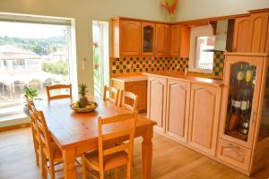 Kuchyň nebo kuchyňský kout v ubytování Artemis House + 32 fotografií
