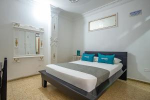 Postel nebo postele na pokoji v ubytování Ayenda William Sanchez