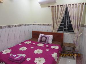 Giường trong phòng chung tại Kep Guesthouse