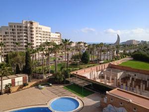 arial view of a city with a pool and buildings at Magic World Aguamarina in Oropesa del Mar
