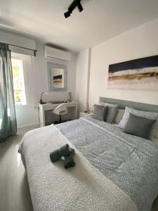 Łóżko lub łóżka w pokoju w obiekcie Apartamento Agata 510 Excelente con vista al mar!!!