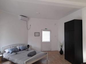 Postel nebo postele na pokoji v ubytování Sobe Išić