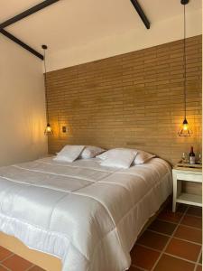 Кровать или кровати в номере Reserva de Gomalu