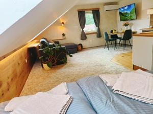 Postel nebo postele na pokoji v ubytování Apartmán u Ovečků - Nová Paka
