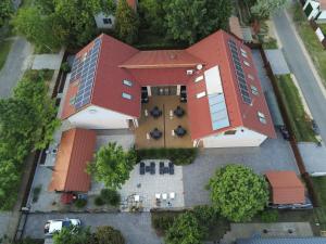 an overhead view of a building with a solarium at Hortobágyi Kemencés Vendégház in Hortobágy