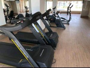 a gym with several tread machines in a room at Salinas Resorts Exclusive, Premium e Park - Elcias Silva in Salinópolis