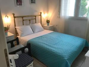 Posteľ alebo postele v izbe v ubytovaní Blue Oasis Maisonette