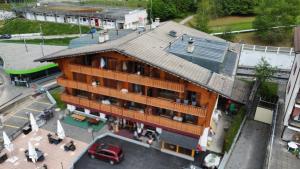 an overhead view of a building with a roof at Zenith Views by Villars Luxury in Villars-sur-Ollon