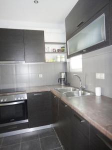 Kuchyň nebo kuchyňský kout v ubytování My Sweet Home BnB North