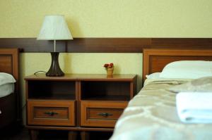 Posteľ alebo postele v izbe v ubytovaní Don Kihot Hotel