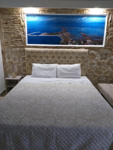 Tempat tidur dalam kamar di Petrakis Beach