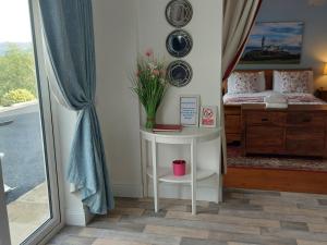 A bed or beds in a room at Bunlin Heights Self Catering Studio