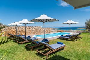 The swimming pool at or near Elios Villas