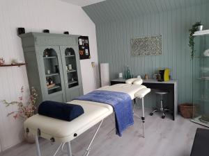 En eller flere senge i et værelse på Vakantieappartement Achat Duitsland