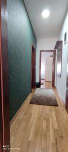 Postel nebo postele na pokoji v ubytování Alex apartman