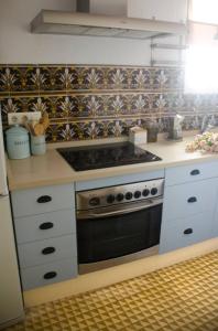 Kuchnia lub aneks kuchenny w obiekcie Apartamentos San Hiscio
