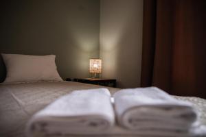 Posteľ alebo postele v izbe v ubytovaní Villa Georgina B&B