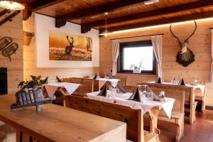 Restaurant o un lloc per menjar a Baita da Rico Zoncolan