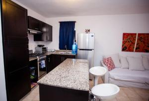 Kuchyň nebo kuchyňský kout v ubytování Apartment 409 Las Cañas - Sosúa