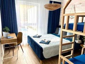 Posteľ alebo postele v izbe v ubytovaní Harbour View Gdynia
