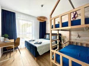 Posteľ alebo postele v izbe v ubytovaní Harbour View Gdynia