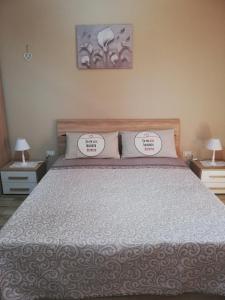 A bed or beds in a room at Monte Granatico