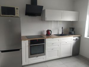 Кухня или мини-кухня в Apartament Na górce
