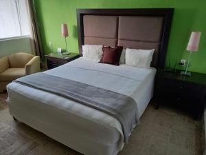 Postel nebo postele na pokoji v ubytování Nirvana Hotel - Cancun Hotel Zone