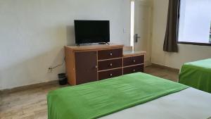 TV a/nebo společenská místnost v ubytování Nirvana Hotel - Cancun Hotel Zone