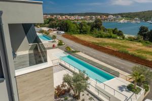 an aerial view of a house with a swimming pool at Apartment MaLu in Banjole