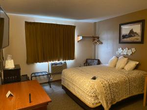 Katil atau katil-katil dalam bilik di Americas Best Value Inn Kadoka