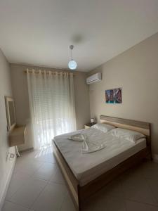 Postel nebo postele na pokoji v ubytování Teo Apartaments + 234 fotografií