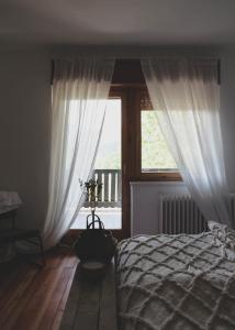 Säng eller sängar i ett rum på Kmetija Pečnik